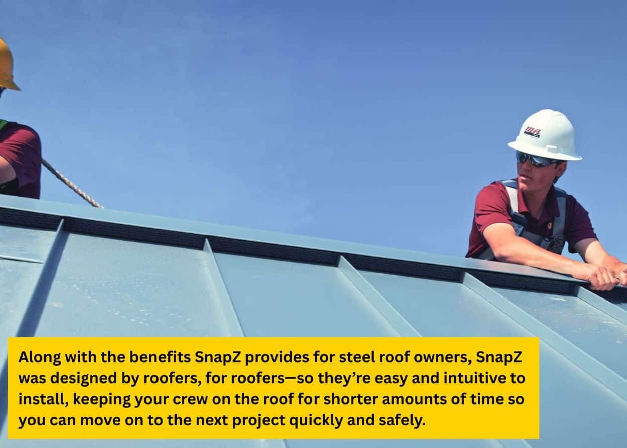 Roofers installing a SnapZ vented metal ridge cap on a standing seam metal roof.