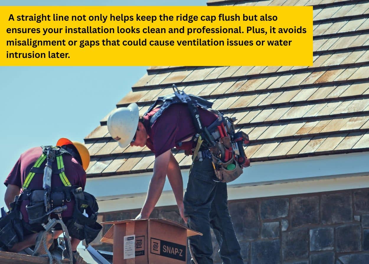 Roofer snapping chalk line to prepare for metal ridge cap installation.