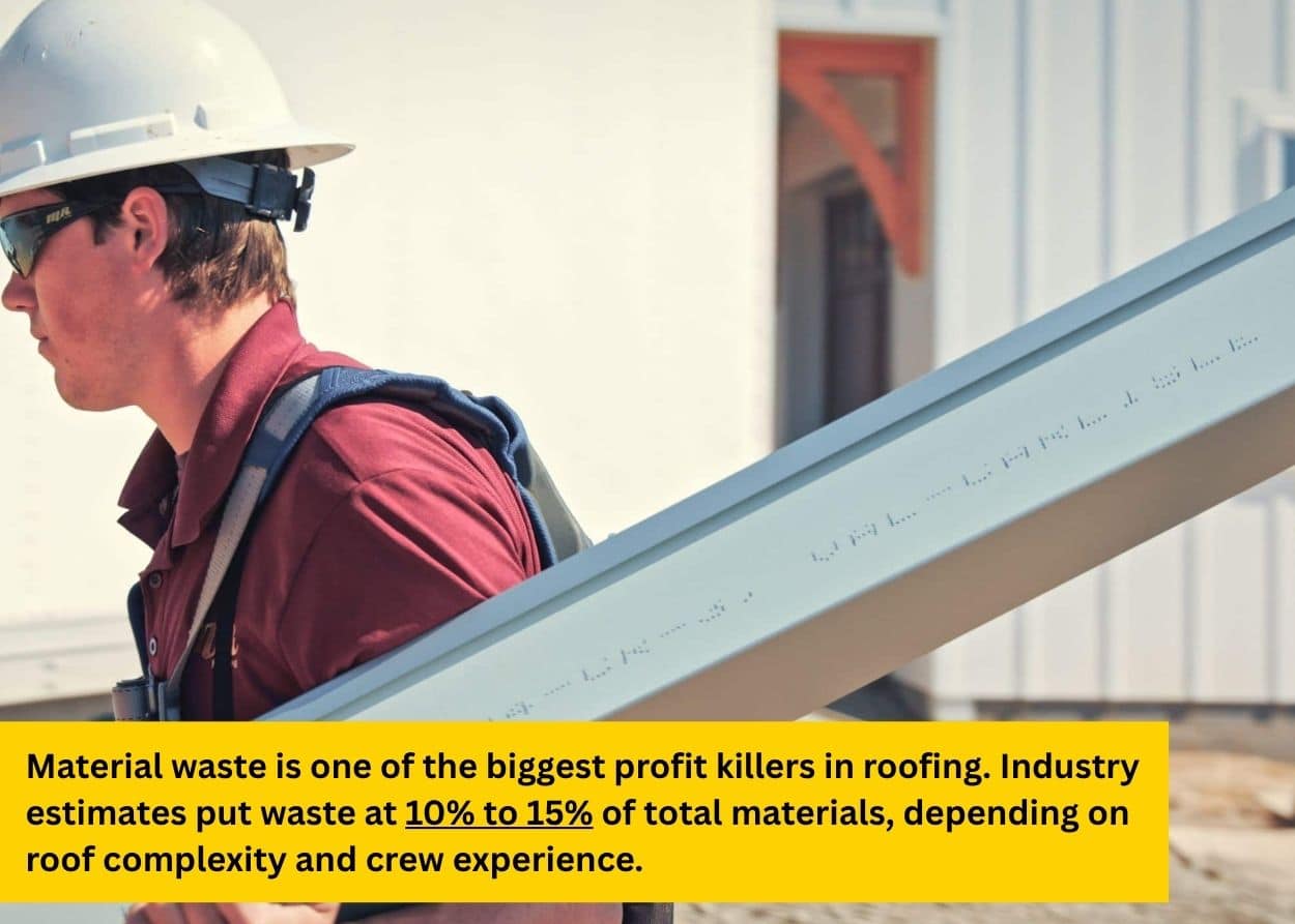 Construction worker carrying metal roofing panel on job site for installation